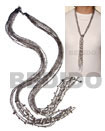 scarf necklace - 7 rows black/tclear glass beads w/ tassled whit